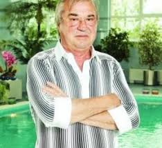 Imperiul financiar a lui George Naghi lasat mostenire vaduvei sale George Naghi